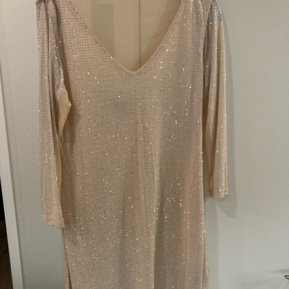 Bebe mini dress ready to be taken to a party!!